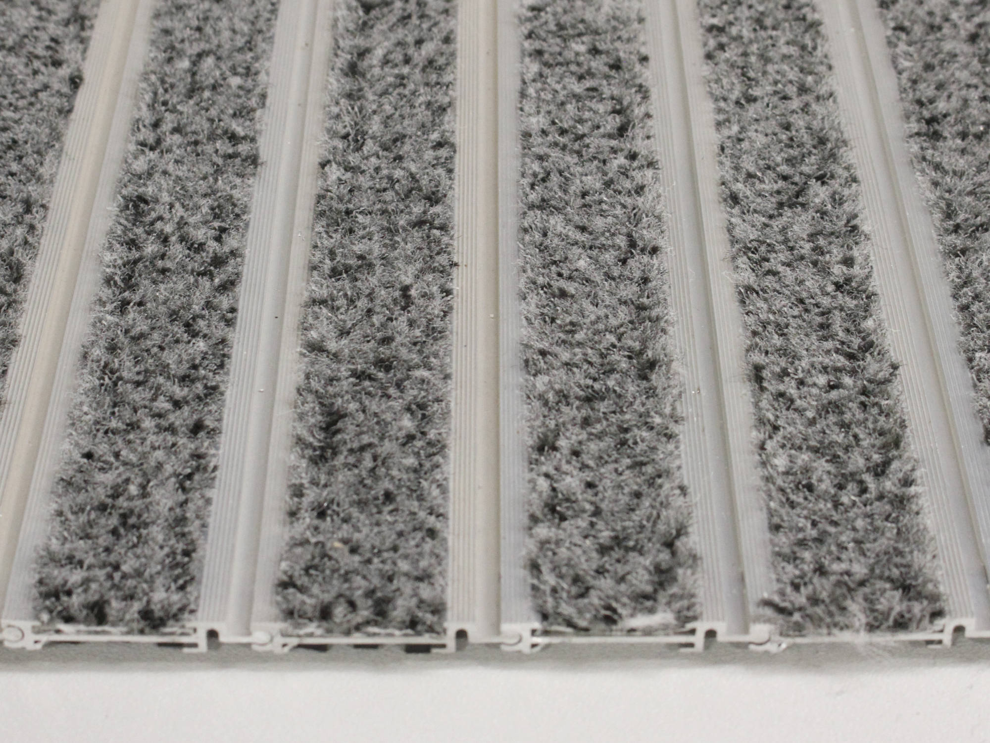 Modèle Insertion de tapis a filament de poils