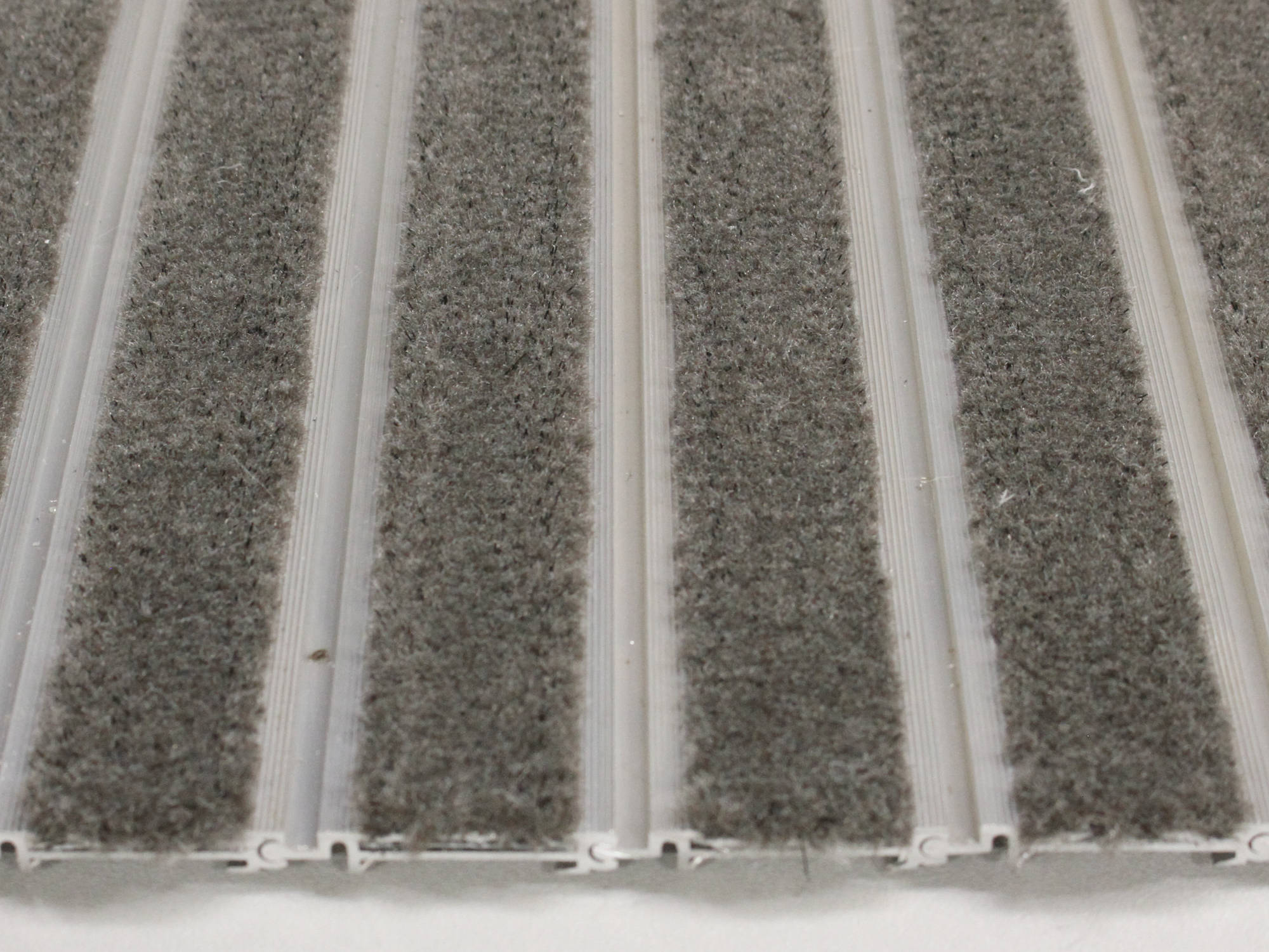 Modèle Insertion de tapis "Maxi-tuft"